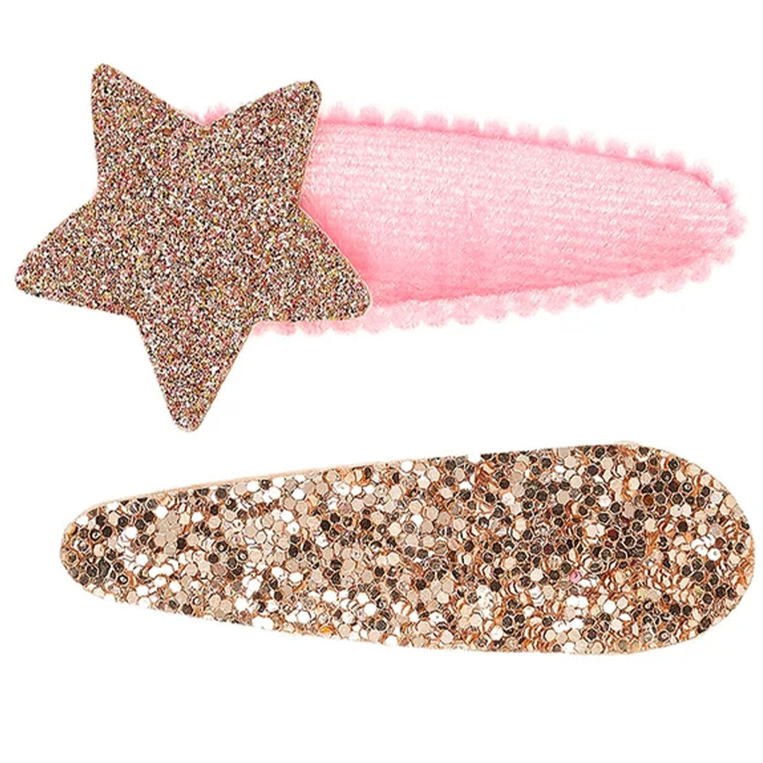 Twee Souza for Kids haarspeldjes, één roze met gouden glitterster en één ovaal gouden glitterspeldje.