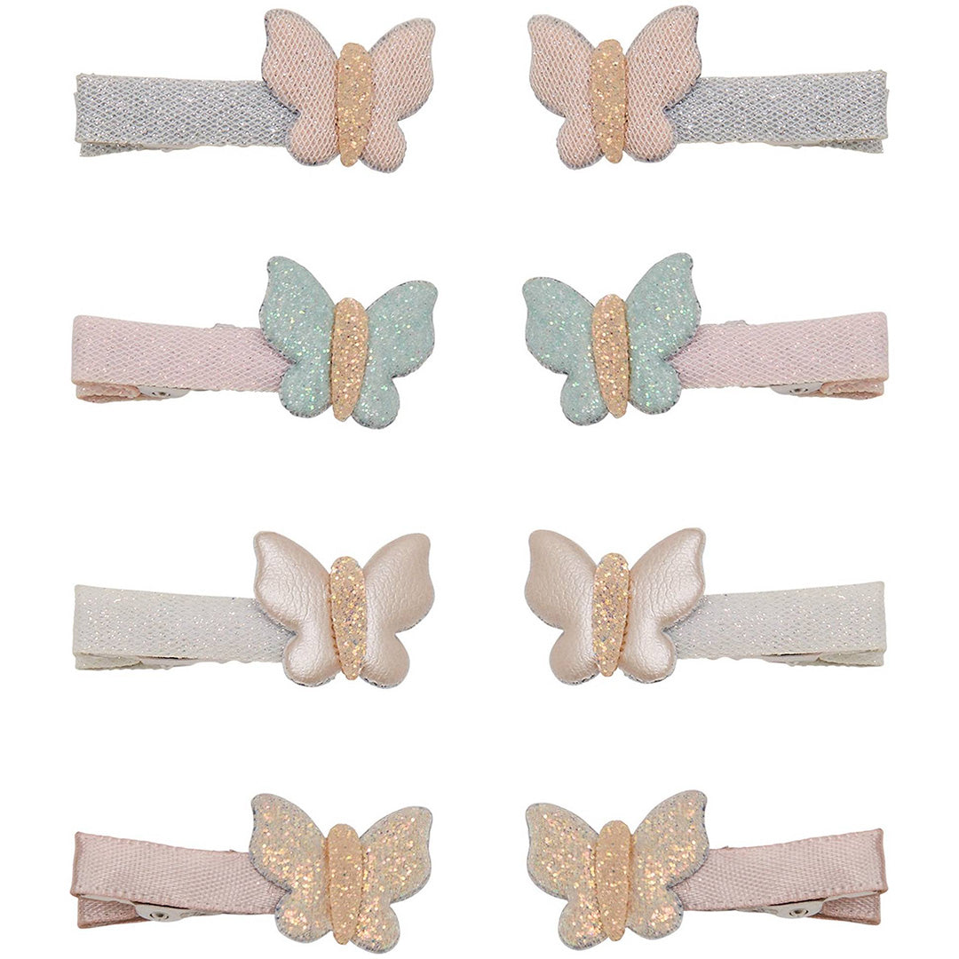 Acht mimi & lula haarclipjes voor kinderen met glitter vlinderdecoratie in pastelkleuren.
