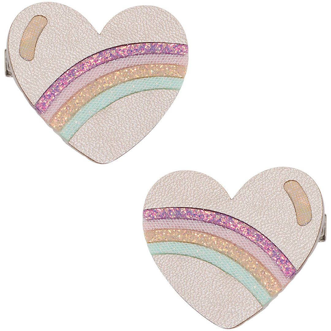 Twee mimi & lula haarclipjes voor kinderen in de vorm van een hart met regenboogstrepen.