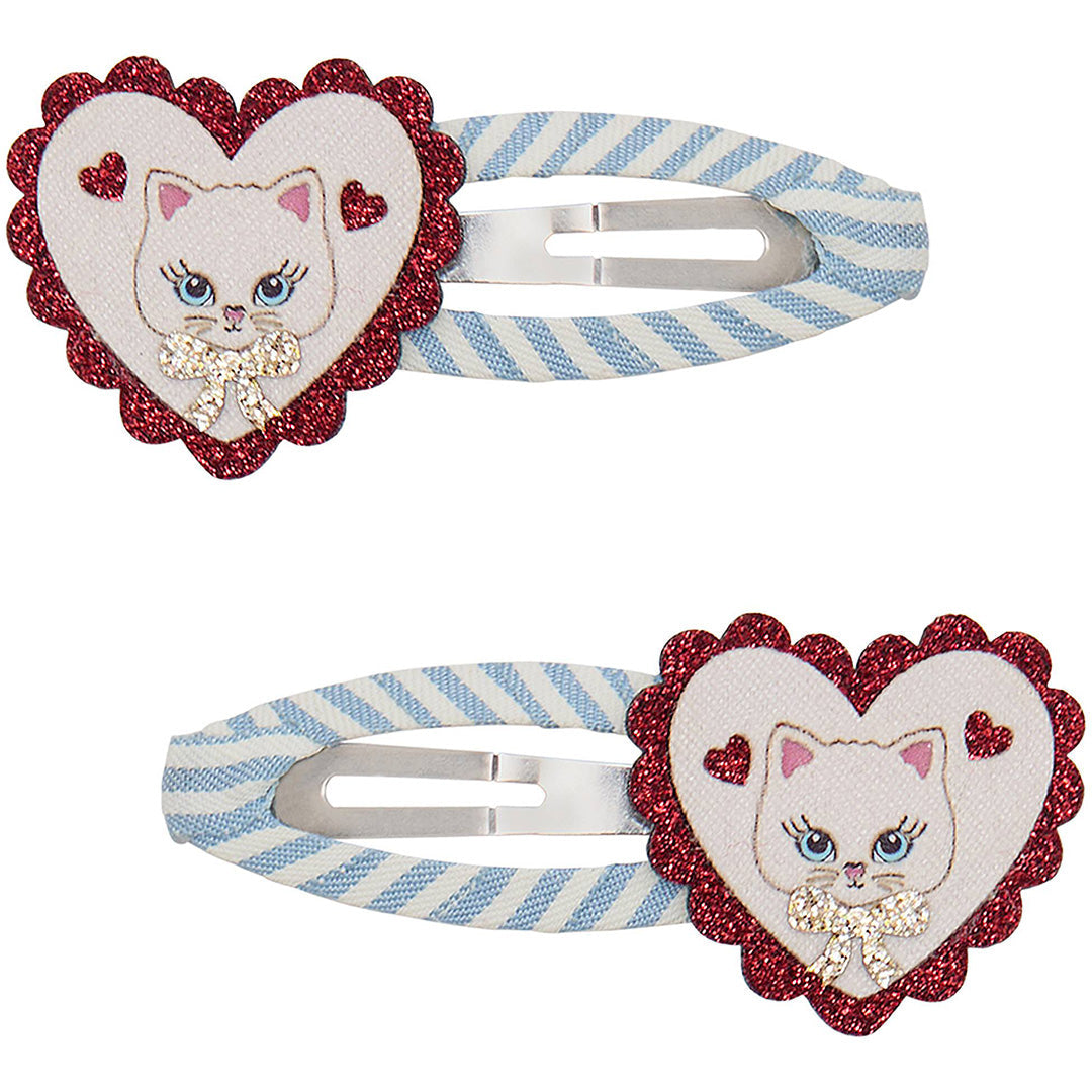 Twee mimi & lula haarclipjes met hartvormige kattengezichten en gestreepte clips.