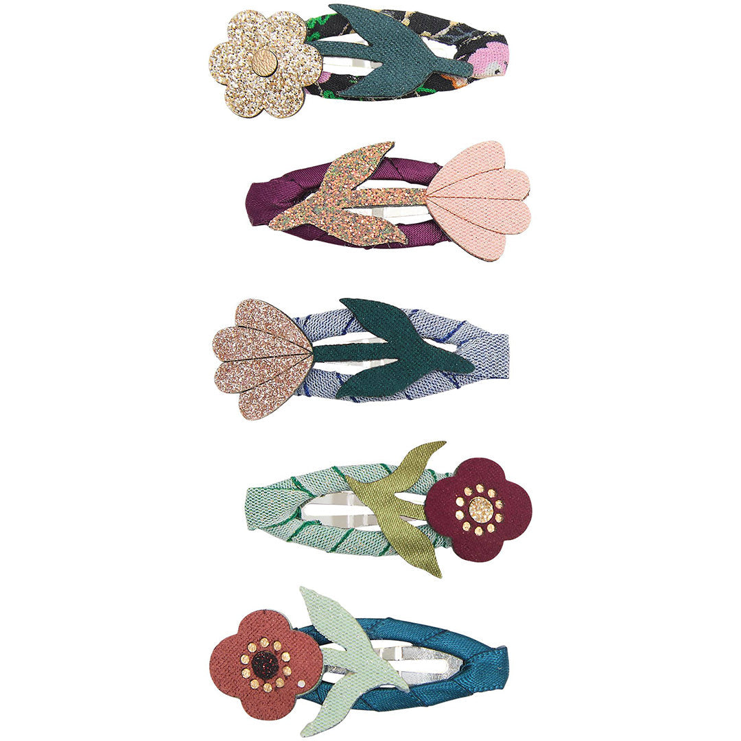 Vijf mimi & lula haarclipjes voor kinderen met versieringen van bloemen, bladeren en vogelvormen.