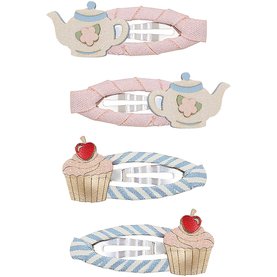 Vier Mimi & Lula haarclipjes voor kinderen, twee roze met theepot en twee blauw gestreepte met cupcake.