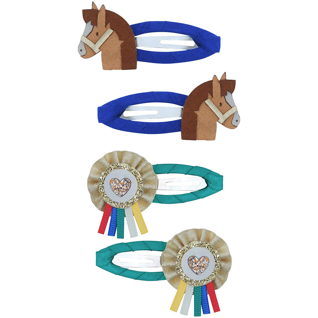 Vier mimi & lula haarclipjes voor kinderen, twee met een paardenhoofd en twee met een rozet.