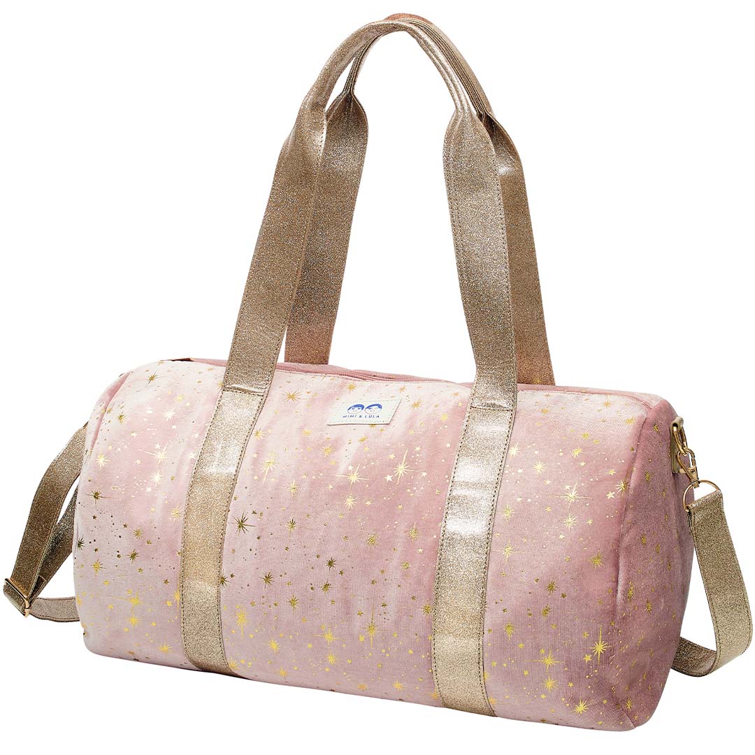 mimi & lula roze fluwelen weekendtas met gouden sterren en glitterbanden.