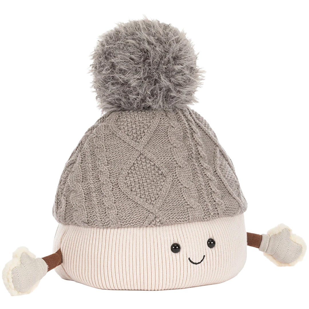 Jellycat pluchen speelgoed van een grijze gebreide muts met pompom, gezichtje en wantjes.