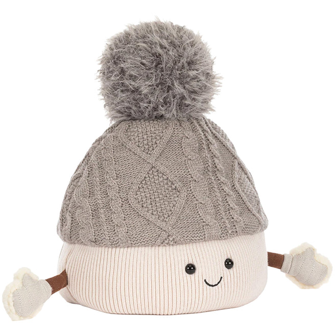 Jellycat pluchen speelgoed van een grijze gebreide muts met pompom, gezichtje en wantjes.