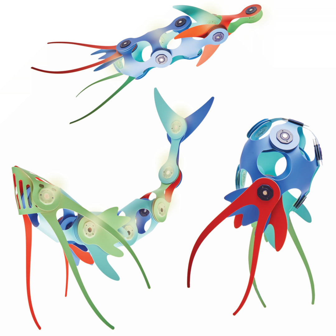 Drie verschillende Clixo magnetische 'ocean creatures' bouwfiguren op een witte achtergrond.