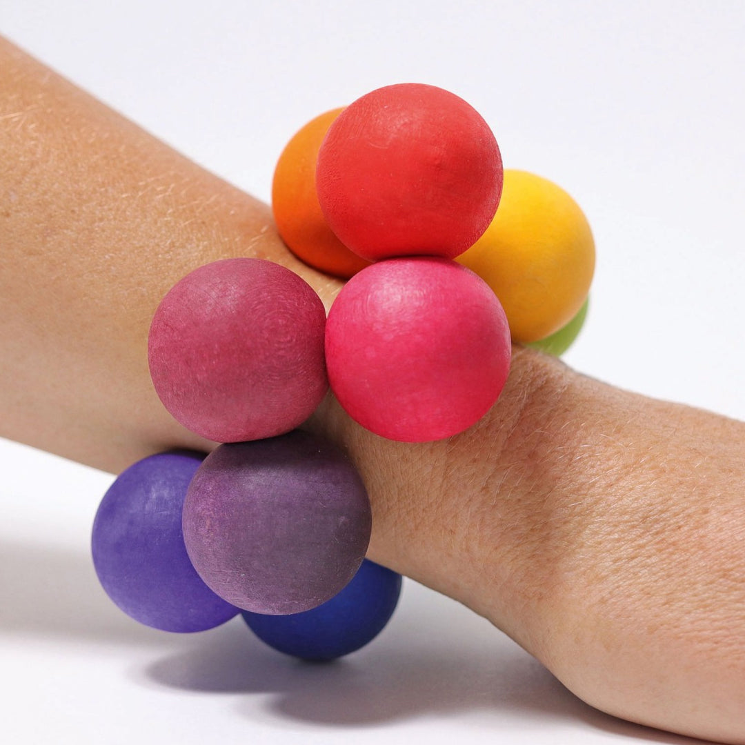 grimm's hochet boules en bois - arc-en-ciel
