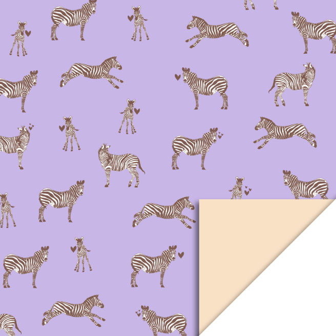house of products inpakpapier met paarse achtergrond en een patroon van zebra's, waarvan een hoek is omgevouwen om de perzikkleurige achterkant te tonen.