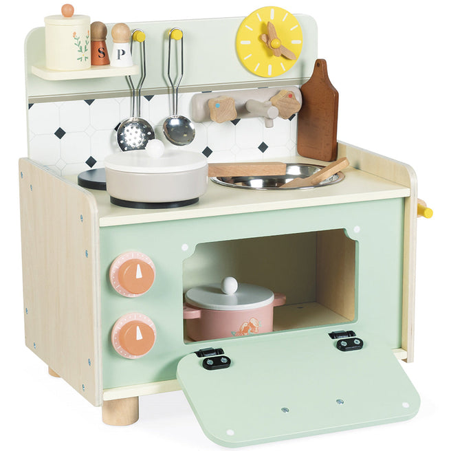 Janod mini speelgoedkeuken in lichtgroen en hout met open oven en diverse accessoires.