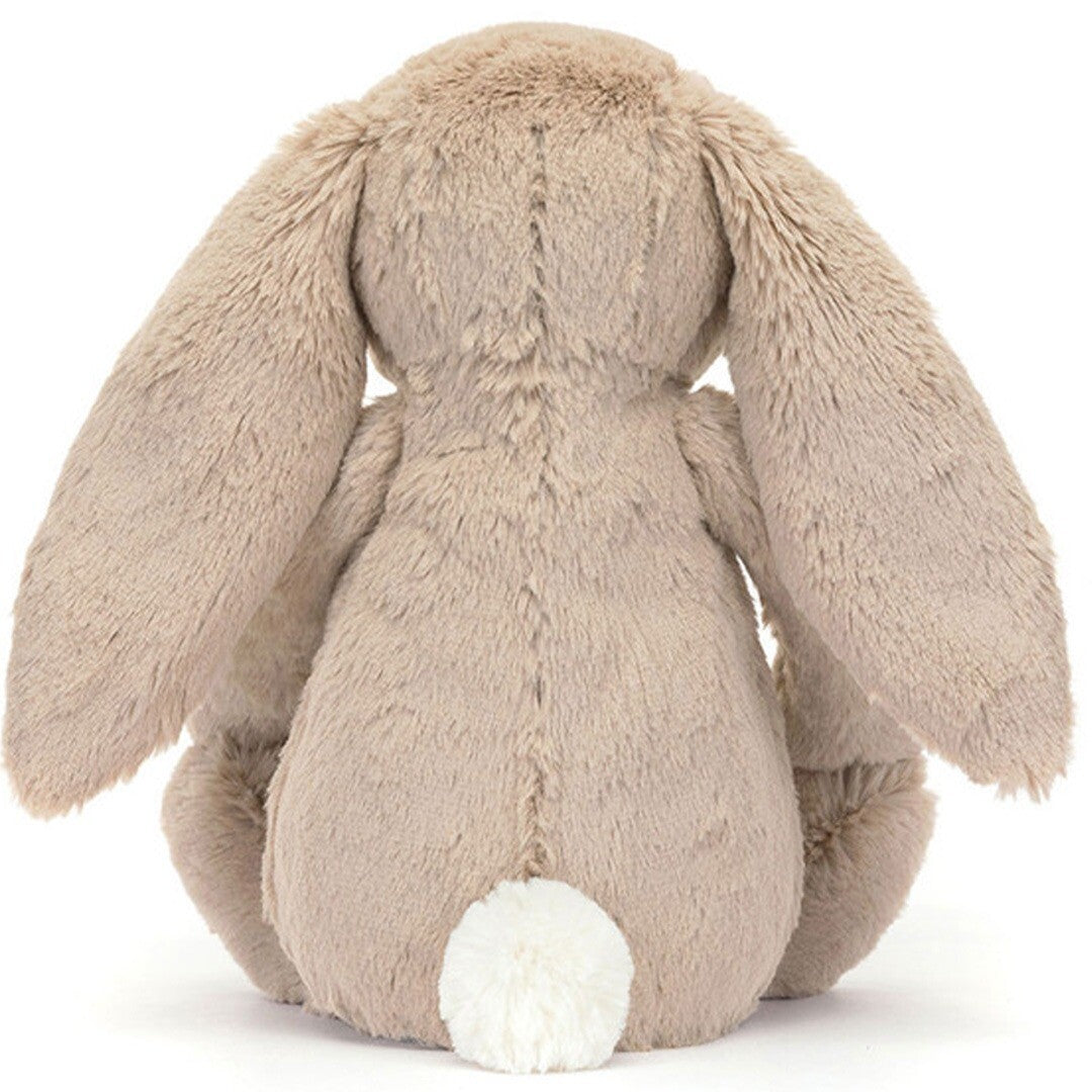 Jellycat knuffelkonijn beige, zittend en van achteren gezien met witte pluimstaart.