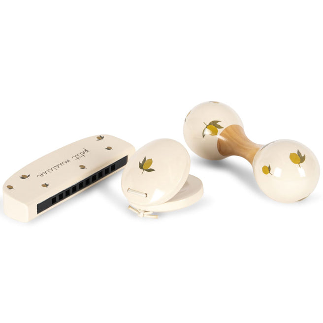 Konges Sløjd 3-delige houten muziekset met beige harmonica, castagnetten en rammelaar met citroenbladpatroon.