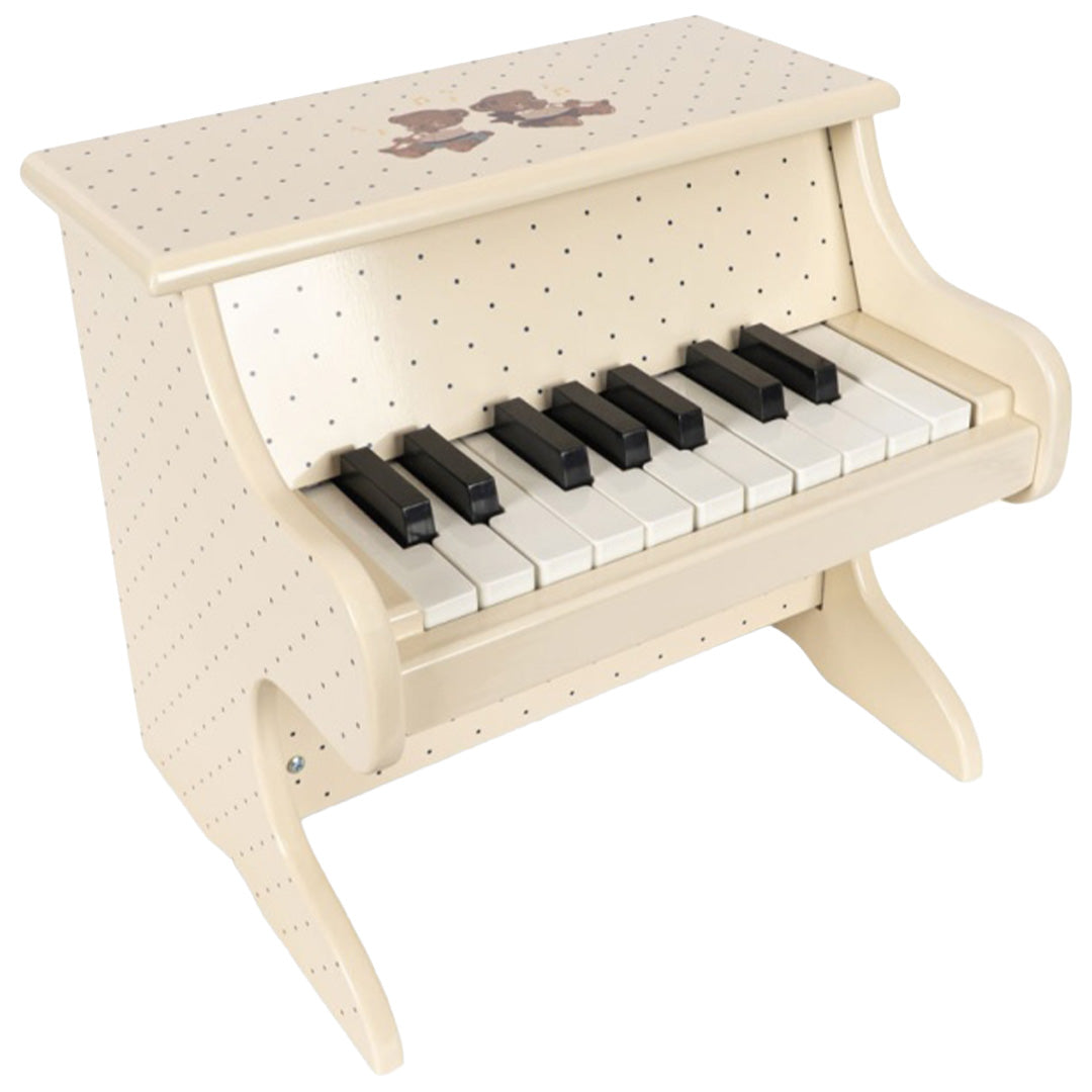 Konges Sløjd houten speelgoedpiano in beige met stippen en teddyberen die trompet spelen.