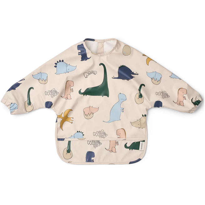 Liewood beige mouwslab met lange mouwen en een dinopatroon, met een voorvakje.