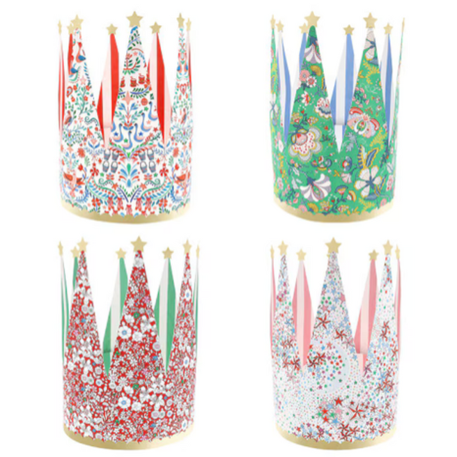 Vier Meri Meri feesthoedjes met verschillende patronen zoals bloemen, vogels, strepen en sterren.
