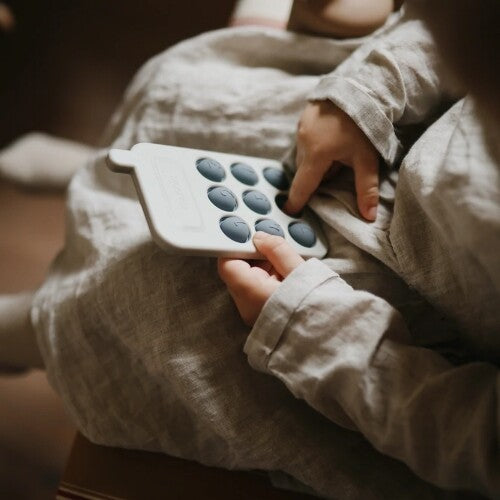 mushie sensorische speelgoedtelefoon - tradewinds | 70.049.02 | 1